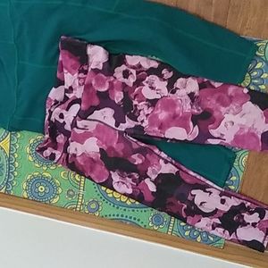 1 large 3/4 length and 1 capri Fabletics. Flowers are capri. Green is powerhold.